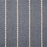 Broadloom carpet in a herringbone pattern in slate blue with a cream stripe accent.