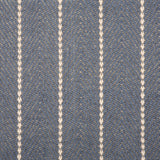 Broadloom carpet in a herringbone pattern in slate blue with a cream stripe accent.