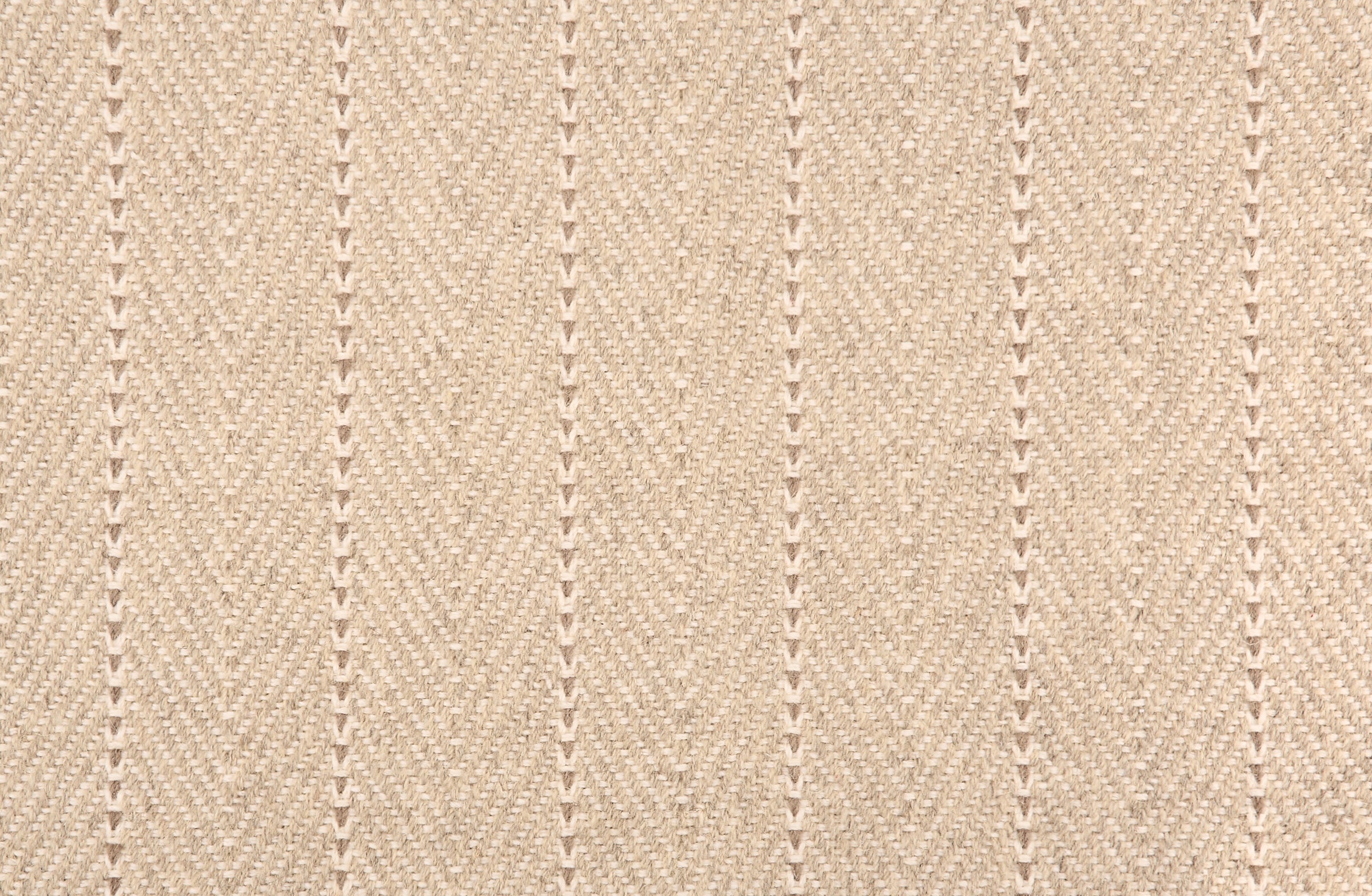 Broadloom carpet in a herringbone pattern in beige with a taupe stripe accent.