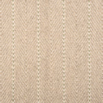 Broadloom carpet in a herringbone pattern in ecru with a sage green stripe accent.