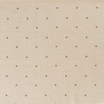 Printed linen fabric in a repeating small-scale flower pattern in red and gray on a cream field.