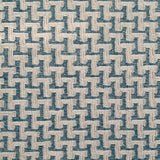 Close up of a handwoven rug with cream stair step stripe on turquoise field. 