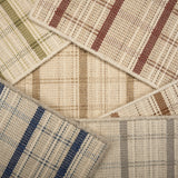 Scattered broadloom samples in windowpane plaid pattern in array of colors. 