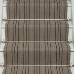 Striped flatweave runner in black and ivory on white staircase