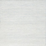 Textural woven carpet in pale sky blue