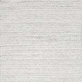 Close-up of white textured woven rug