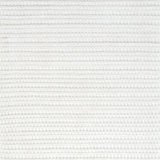 Close-up of bright white textured woven rug