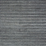 Textured black and white woven rug.