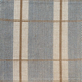 Woven rug with plaid pattern in blue, beige, and white