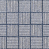Broadloom carpet in a square grid with checkerboard stripes in shades of blue. 