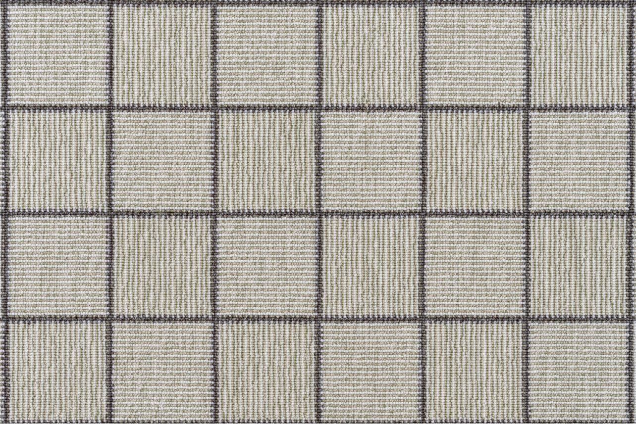 Broadloom carpet in a grey square grid with checkerboard stripes in shades of taupe.