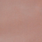 Detail of velvet fabric yardage in mauve.