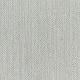 Close up of a broadloom carpet with a herringbone stripe in pale blue.