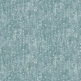 Painterly small-scale dashed dot print in white on a soft peacock blue watercolor field.