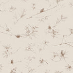Detail of wallpaper in a painterly pine cone and branch print in brown on a cream field.