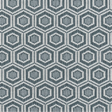 Broadloom carpet in a dimensional hexagonal lattice in white and teal.
