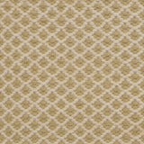 Handwoven rug with small scale diamond lattice in cream on a pale green field. 