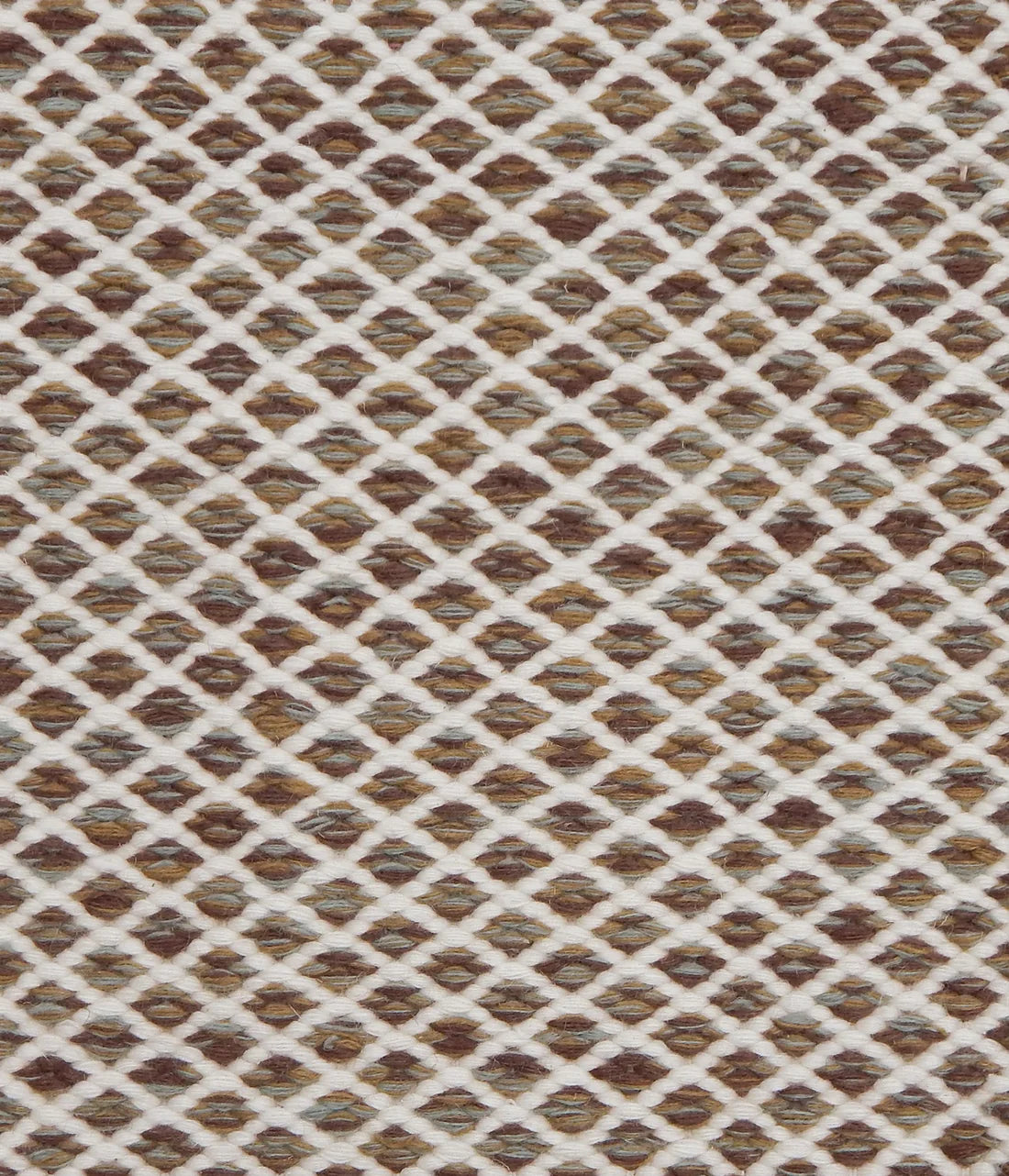 Handwoven rug with small scale diamond lattice in cream on a brown field. 