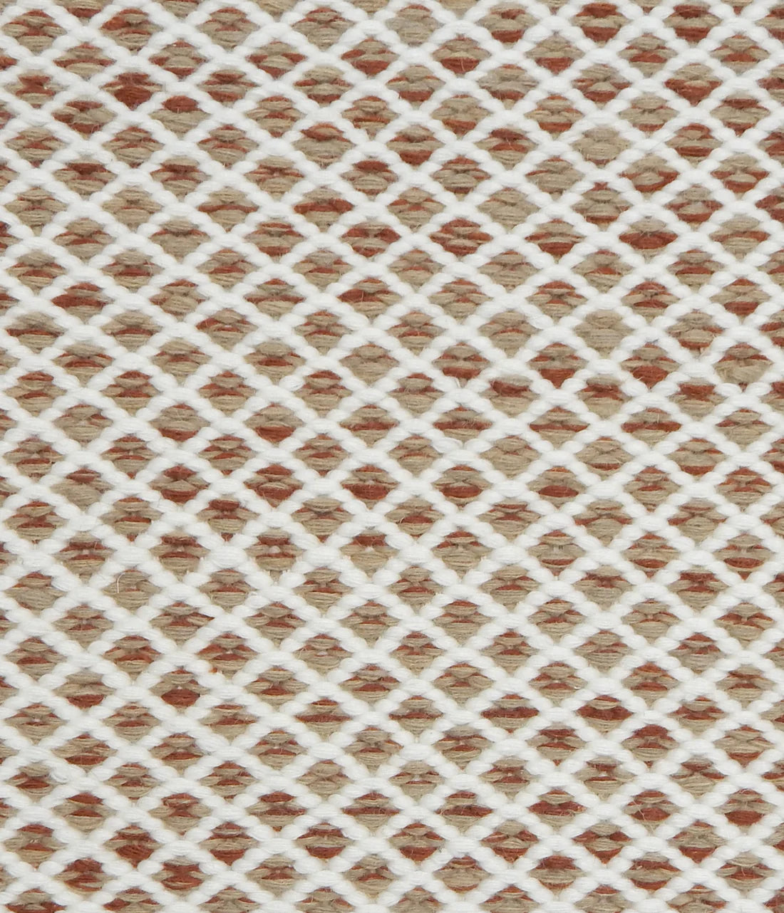 Handwoven rug with small scale diamond lattice in cream on a tan and tan and red field. 