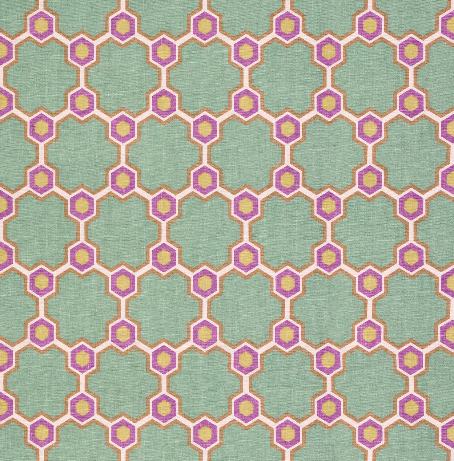 Detail of fabric in a geometric honeycomb pattern in shades of green, purple, white and orange.