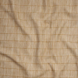 Close up of gently draped woven Indoor-Outdoor fabric with thin hand drawn stripe grid in ivory on tan.