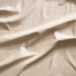 Close up of gently draped woven Indoor-Outdoor fabric with thin hand drawn stripe grid in ivory on ecru.
