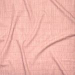 Close up of gently draped printed linen with thin hand drawn stripe grid in tonal pink.