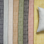 Gently draped fabric cuttings with a hand drawn broken stripe in various colors.