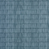 Close up of grasscloth with dashed striped grid in tonal blues. 