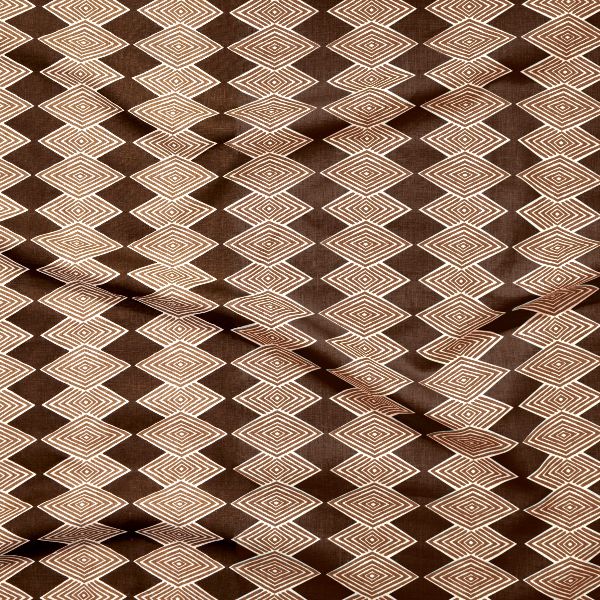 Close up of gently draped printed linen with linear stacked diamond stripe in shades of brown.