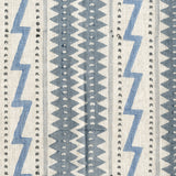 Fabric in a playful stripe and zigzag pattern in shades of gray and blue on a cream field.