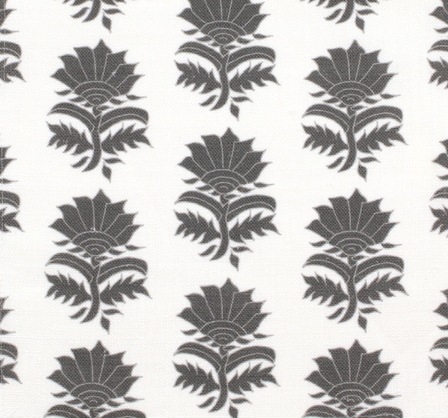 Detail of fabric in a repeating thistle print in gray on a white field.