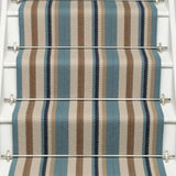 Striped flatweave runner in blue tan cream and black on white staircase