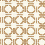 Detail of fabric in a round geometric grid print in light brown on a cream field.