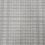 Broadloom carpet in a cream and grey.