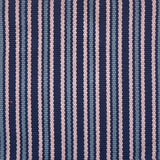 Detail of a hand-woven cotton fabric in a stripe pattern in shades of purple, pink and blue.