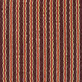 Detail of a hand-woven cotton striped fabric in shades of red, brown and yellow.
