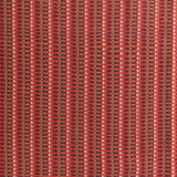 Detail of a hand-woven cotton fabric in an intricate stripe pattern in shades of red, maroon, navy and tan.