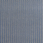 Detail of a hand-woven cotton fabric in a grid pattern in blue and tan.