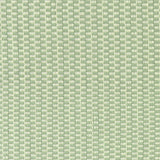 Detail of a hand-woven cotton fabric in a grid pattern in sage and cream.