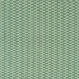 Detail of a hand-woven cotton fabric in a grid pattern in sage and teal.