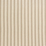 Detail of a hand-woven cotton fabric in an intricate gridded stripe pattern in shades of cream, tan and white.