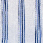 Detail of a hand-woven cotton fabric in an irregular stripe pattern in navy and blue on a white field.