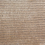 Broadloom carpet in a lightly ribbed cut pile in warm beige. 