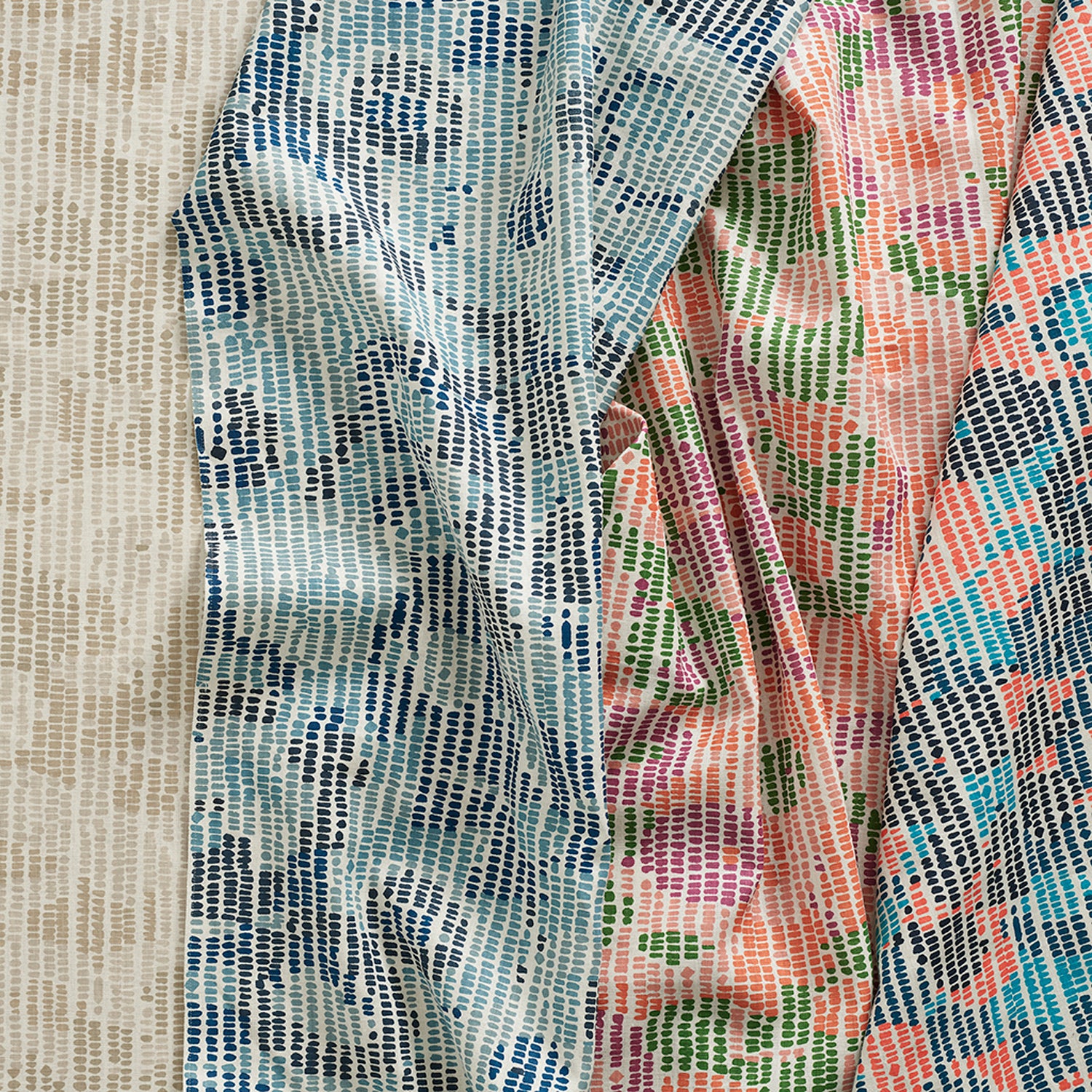 Gently draped fabric cuttings with a abstract dotted floral design in various colors. 