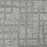 Broadloom carpet sample in a irregular plaid pattern in pale grey