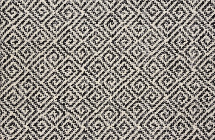 Broadloom carpet swatch in a geometric pattern in a black white design