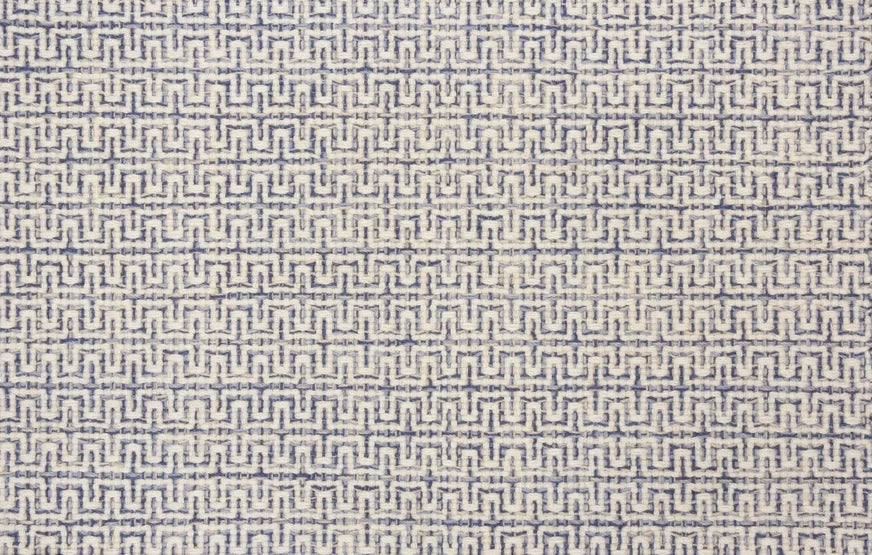 Broadloom carpet swatch in a geometric pattern in a blue white design
