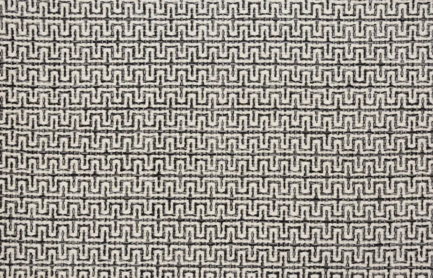 Broadloom carpet swatch in a geometric pattern in a black white design