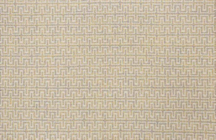 Broadloom carpet swatch in a geometric pattern in a grey yellow design